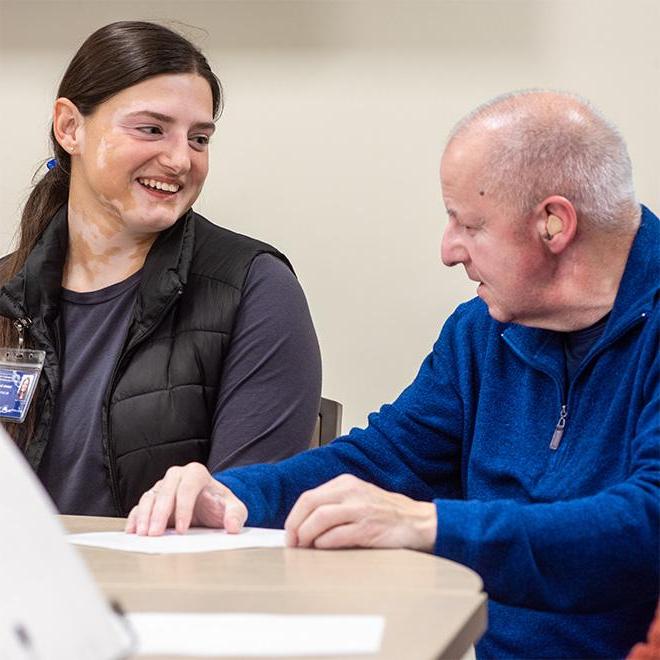 working with patients at the speech language pathology clinic